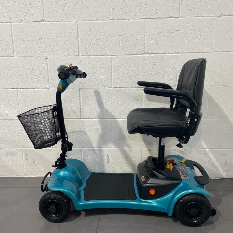 Turquoise and Black 4 Wheeled Scooter with Basket and Swivel Seat Side Profile Rascal Ultralite 480