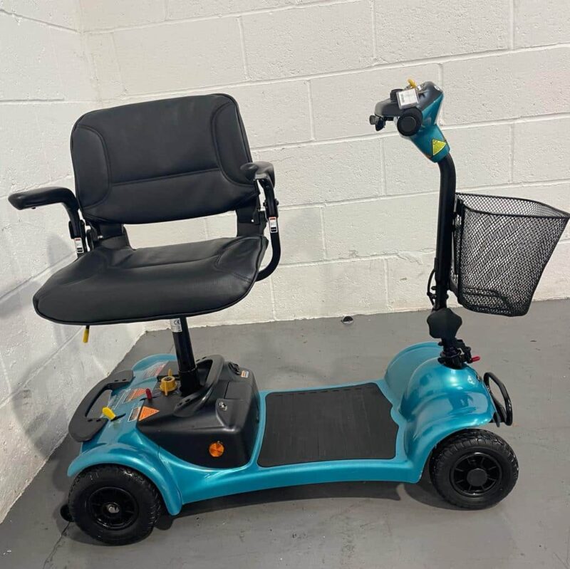 Turquoise and Black 4 Wheeled Scooter with Basket and Swivel Seat Side Profile with Seat Turned for Transfer Rascal Ultralite 480