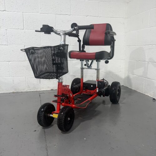 Front Left Angle View of a Red Second-hand Lightweight Transportable Supascoota Sport Xl Mobility Scooter Used Mobility Scooter Shop | Second Hand Mobility Scooters!
