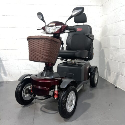 Front left angle view of a purple second-hand class three road legal Eden Roadmaster Mobility Scooter