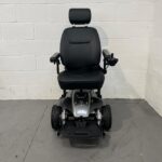 View of the Front of a Second-hand Silver and Black I-go Zenith Pro Powered Wheelchair. I-go Zenith Pro