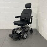 Three-quarter View of the Right and Front of a Second-hand Silver and Black I-go Zenith Pro Powered Wheelchair. I-go Zenith Pro