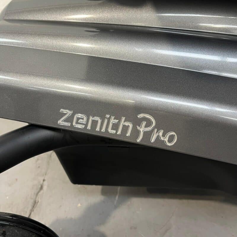 Closeup of the Zenith Pro Logo on the Side of a Second-hand Silver and Black I-go Zenith Pro Powered Wheelchair. I-go Zenith Pro