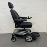 View of the Right-hand Ride of a Second-hand Silver and Black I-go Zenith Pro Powered Wheelchair. I-go Zenith Pro