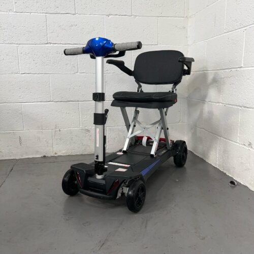 a Three Quarter View of the Front and Left Side of a Second-hand Lightweight Folding Blue and Black Mobifree Folding Mobility Scooter. Cart