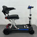a View of the Right Side of a Second-hand Lightweight Folding Blue and Black Mobifree Folding Mobility Scooter. Mobifree Folding Scooter Blue (2024)