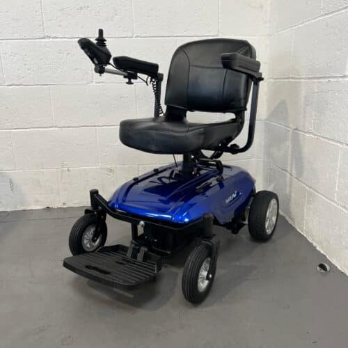 a Three-quarter View of the Front and Left Side of a Second-hand Blue Mobility Plus Quick Split Powered Wheelchair. Used Mobility Scooter Shop | Second Hand Mobility Scooters!