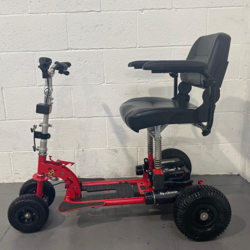 Left-side View of a Second-hand Three-wheeled Red Supascoota Sport Xl Mobility Scooter. Supascoota Sport (lead Acid)