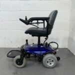 Photo of the Left Side of a Used, Blue and Black Careco Fenix Second-hand Powerchair. Careco Fenix Powerchair
