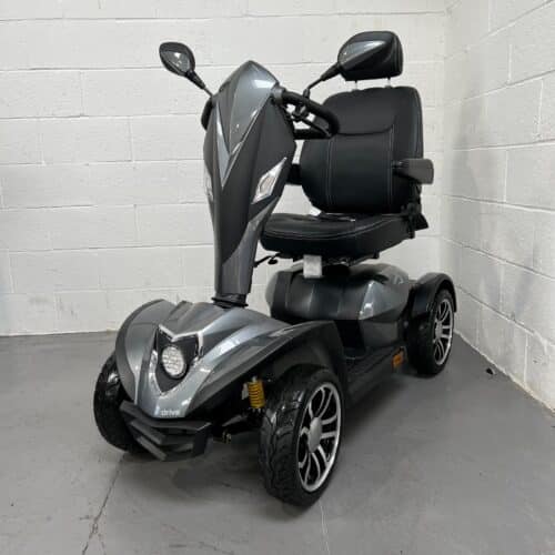 Threee-quarter View of the Left Side and Front of a Grey, 8mph Road-legal Drive Cobra Mobility Scooter. Delivery Policy
