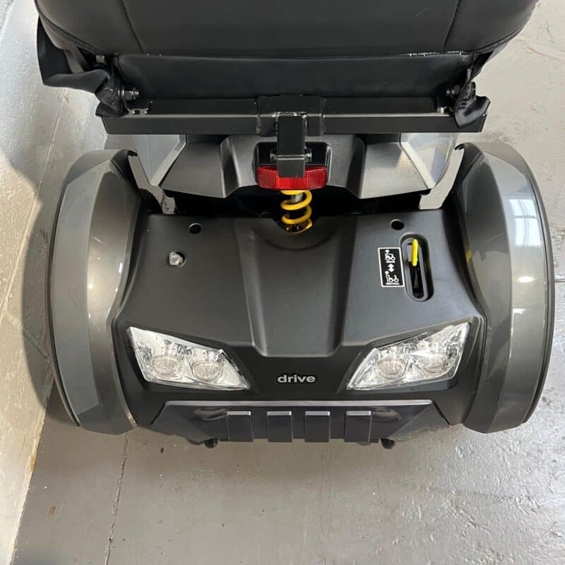 Close-up View of the Rear of a Grey, 8mph Road-legal Drive Cobra Mobility Scooter. Shows the Scooter is Fitted with Rear Suspension and a Handbrake. Drive Cobra (grey)