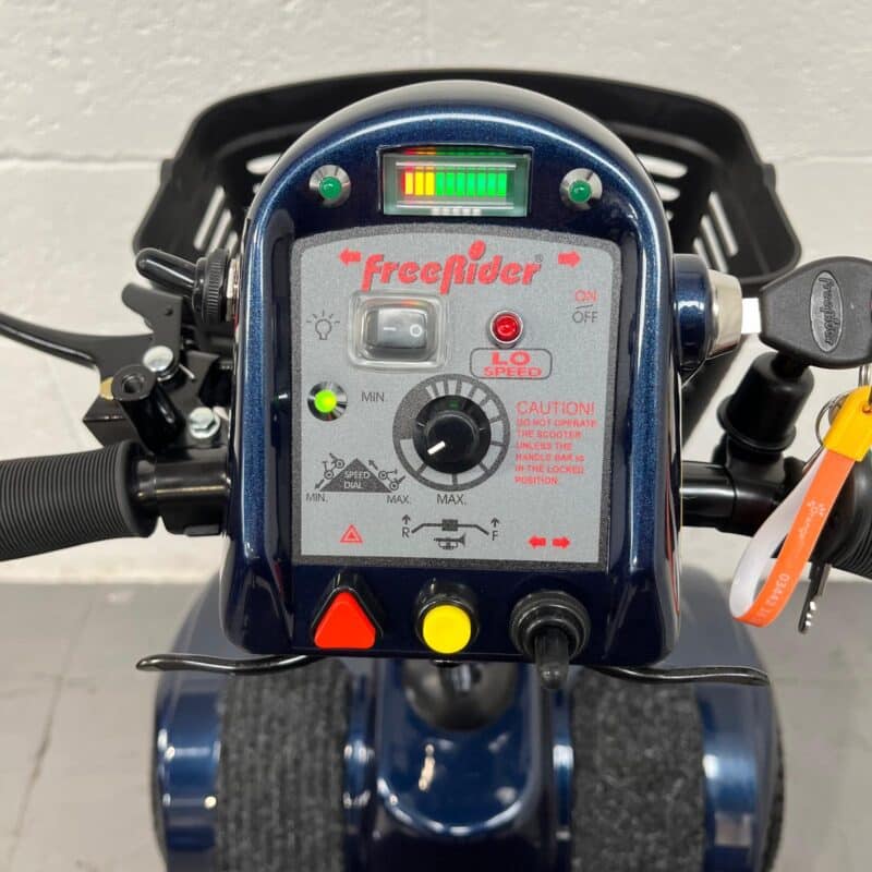 Close-up of the Controls and Battery Indicator on a Dark Blue Second-hand Freerider Kensington S Mobility Scooter. Freerider Kensington S
