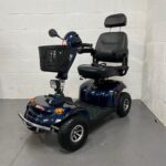 Three-quarter View of the Left Side and Front of a Dark Blue Second-hand Freerider Kensington S Mobility Scooter. Freerider Kensington S