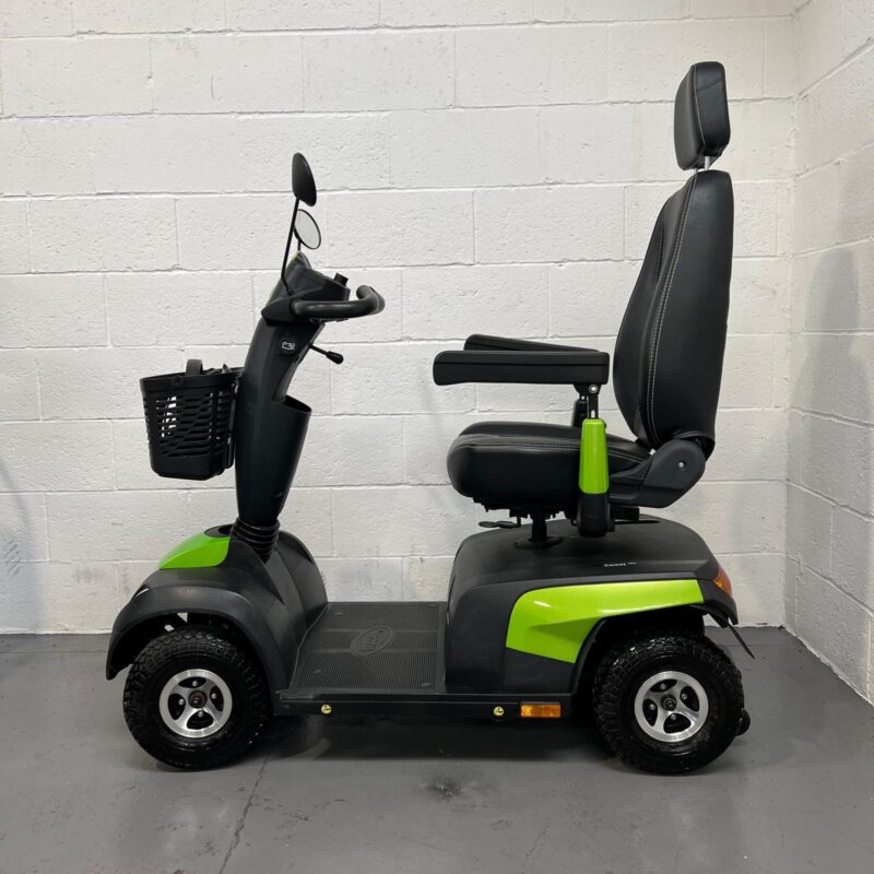 View of the Left Side of a Green and Black, 8mph, Road-legal, Second-hand Invacare Comet Pro Mobility Scooter. Invacare Comet Pro