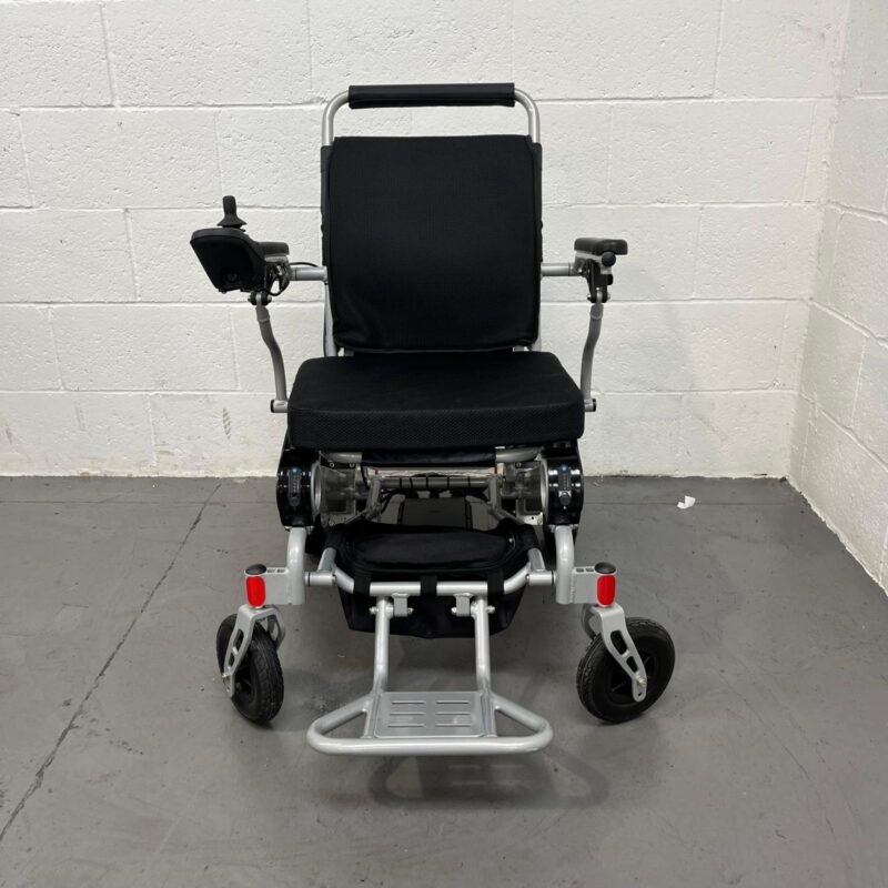 Front View of a Second-hand Silver and Black Kwk D09 Powerchair. Kwk D09 Powerchair