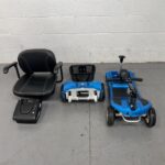 Photo of a Used Blue and Black Li-tech Neon 15 Second-hand Mobility Scooter, Deconstructed into 5 Parts for Easy Transportation. Li-tech Neon 15