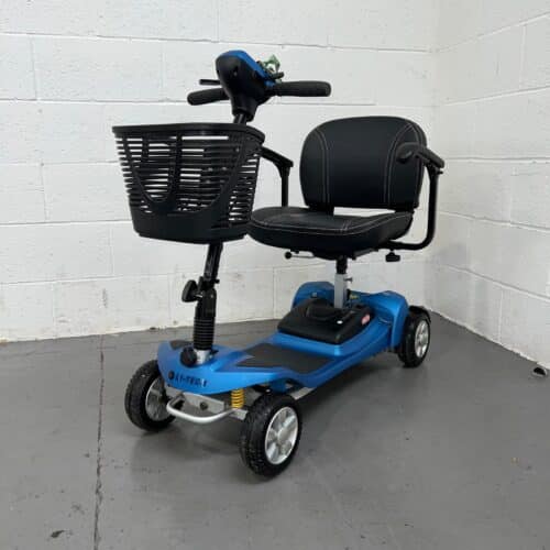 Photo showing three-quarter view of the left side and front of a used blue and black Li-Tech Neon 15 second-hand mobility scooter.
