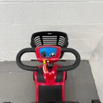 View of the Controls on a Second-hand Red One Rehab Illusion Transportable Mobility Scooter. One Rehab Illusion (red)