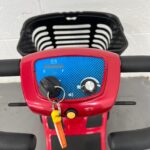 Close-up View of the Controls on a Second-hand Red One Rehab Illusion Transportable Mobility Scooter. One Rehab Illusion (red)