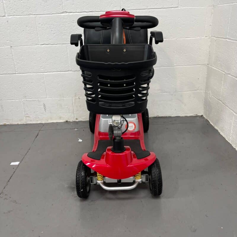 View of the Front of a Second-hand Red One Rehab Illusion Transportable Mobility Scooter. One Rehab Illusion (red)