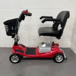 View of the Left-hand Side of a Second-hand Red One Rehab Illusion Transportable Mobility Scooter. One Rehab Illusion (red)