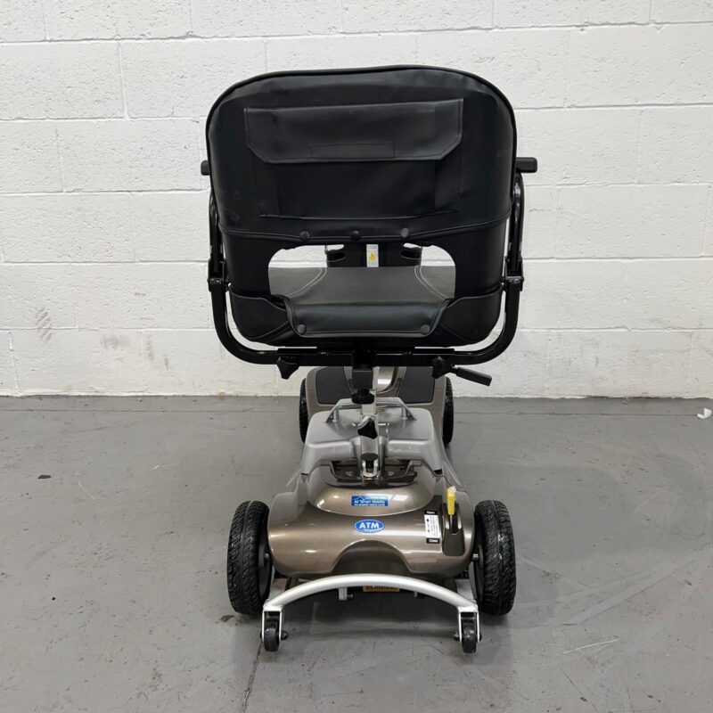 Photo Showing the Rear of a Used Bronze and Black One Rehab Illusion Second-hand Mobility Scooter. One Rehab Illusion