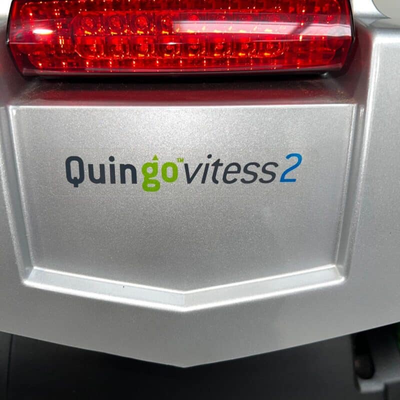 Close-up View of the Vitess 2 Logo on the Rear of a Silver, 8mph Road-legal Second-hand Quingo Vitess 2 Mobility Scooter. Quingo Vitess 2 (only 2 Miles)