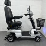 View of the Right Side of a Silver, 8mph Road-legal Second-hand Quingo Vitess 2 Mobility Scooter. Quingo Vitess 2 (only 2 Miles)