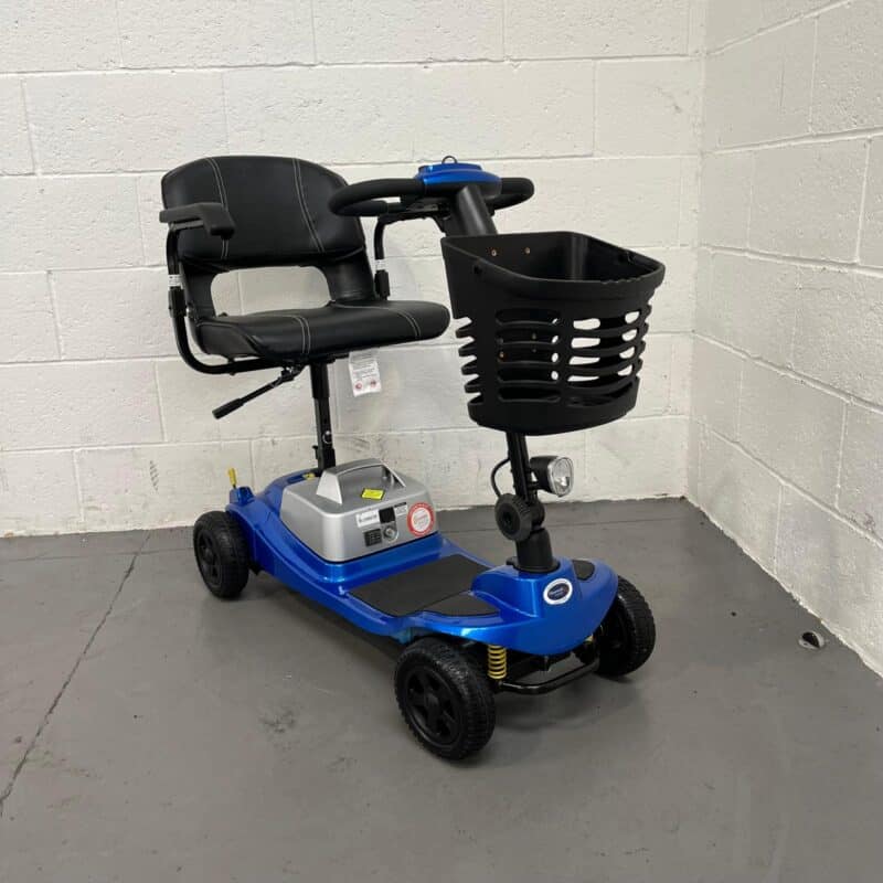 Photo Showing a Three-quarter View of the Right Side and Front of a Blue Clearwell Aguna Comfort Second-hand Mobility Scooter. Clearwell Aguna Lithium