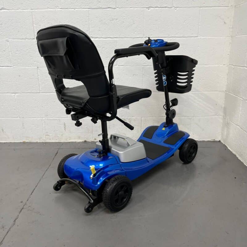 Photo Showing a Three-quarter View of the Right Side and Rear of a Blue Clearwell Aguna Comfort Second-hand Mobility Scooter. Clearwell Aguna Lithium