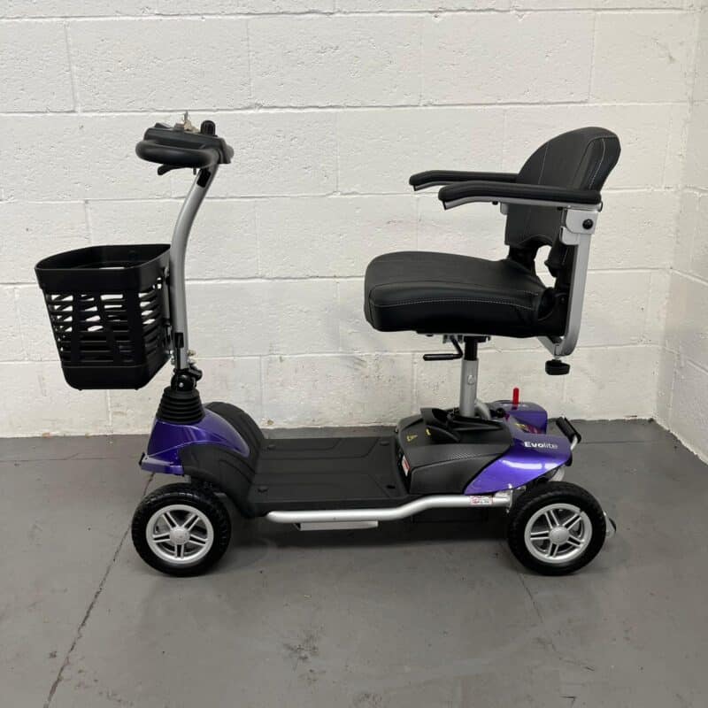 Photo of the Left Side of a Purple and Black, Motion Healthcare Evolite Second-hand Mobility Scooter. Motion Healthcare Evolite
