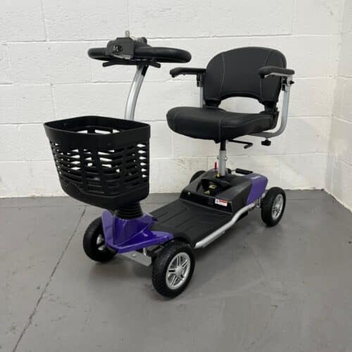 Photo Showing a Three-quarter View of the Left Side and Front of a Purple and Black, Motion Healthcare Evolite Second-hand Mobility Scooter. Terms & Conditions