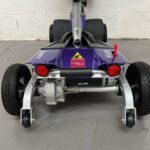 Photo Showing a Close-up View of the Rear of a Purple and Black, Motion Healthcare Evolite Second-hand Mobility Scooter. Motion Healthcare Evolite