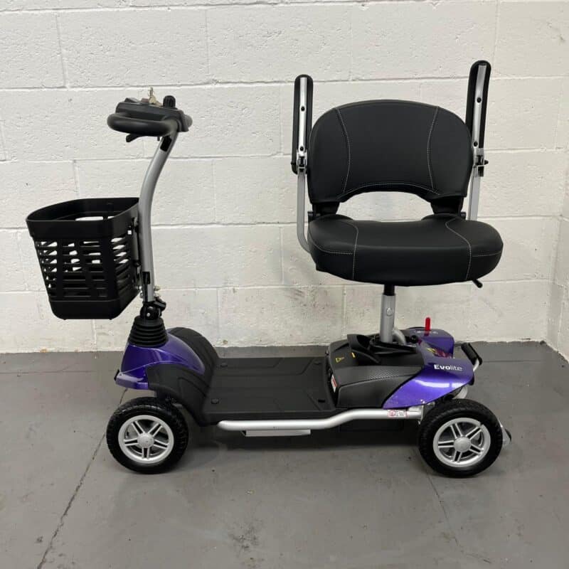 Photo of the Captains Seat Rotated 90 Degrees on a Purple and Black, Motion Healthcare Evolite Second-hand Mobility Scooter. Motion Healthcare Evolite