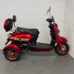 Photo of the Right Side of a Dark Red, Greenpower Unique 500 Second-hand Mobility Scooter. Greenpower Unique 500