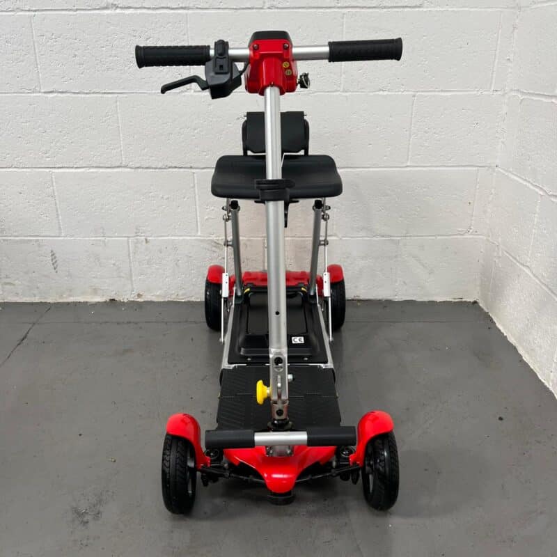 Photo of the Front of a Red and Black, Motion Healthcare Mlite Second-hand Mobility Scooter. Motion Healthcare Mlite