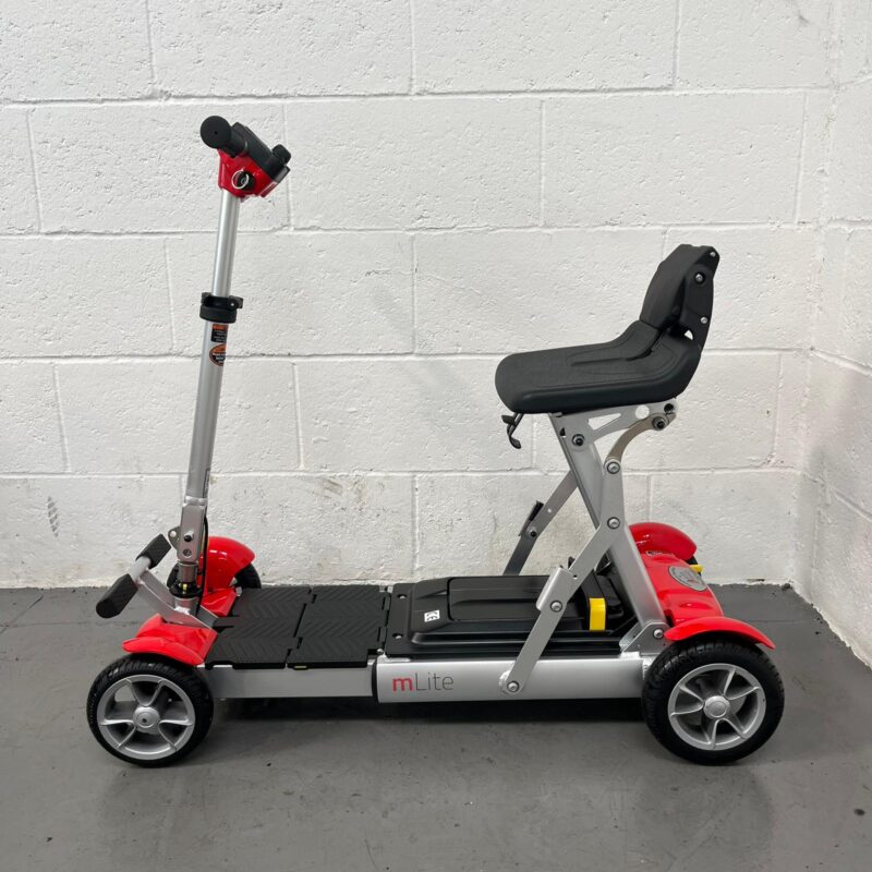 Photo of the Left Side of a Red and Black, Motion Healthcare Mlite Second-hand Mobility Scooter. Motion Healthcare Mlite
