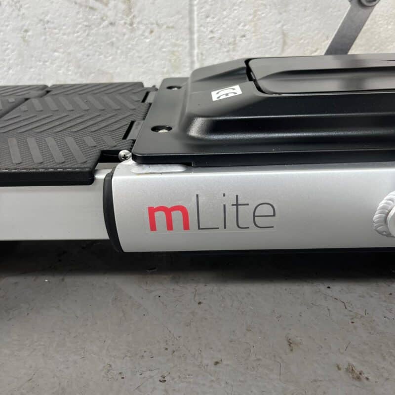 Photo of the Mlite Logo on the Side of a Red and Black, Motion Healthcare Mlite Second-hand Mobility Scooter. Motion Healthcare Mlite