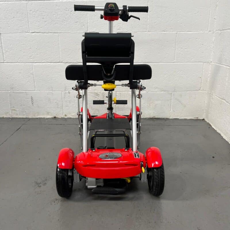 Photo Showing a Close-up View of the Rear of a Red and Black, Motion Healthcare Mlite Second-hand Mobility Scooter. Motion Healthcare Mlite