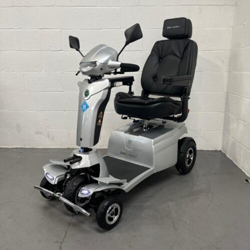 Photo Showing a Three-quarter View of the Left Side and Front of a Silver and Black Quingo Toura 2 Second-hand Mobility Scooter. Used Mobility Scooter Shop | Second Hand Mobility Scooters!