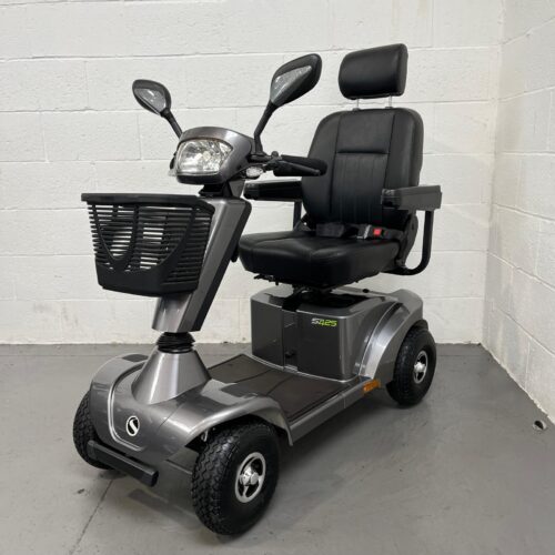 Photo showing a three-quarter view of the left side and front of a silver and black, Stirling S425 second-hand mobility scooter.