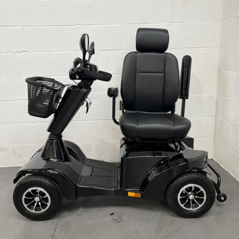 Photo Showing the Captains Seat Turned 90 Degrees on a Black Stirling S700 Second-hand Mobility Scooter, for Easy Mounting and Dismounting. Sunrise Medical Sterling S700