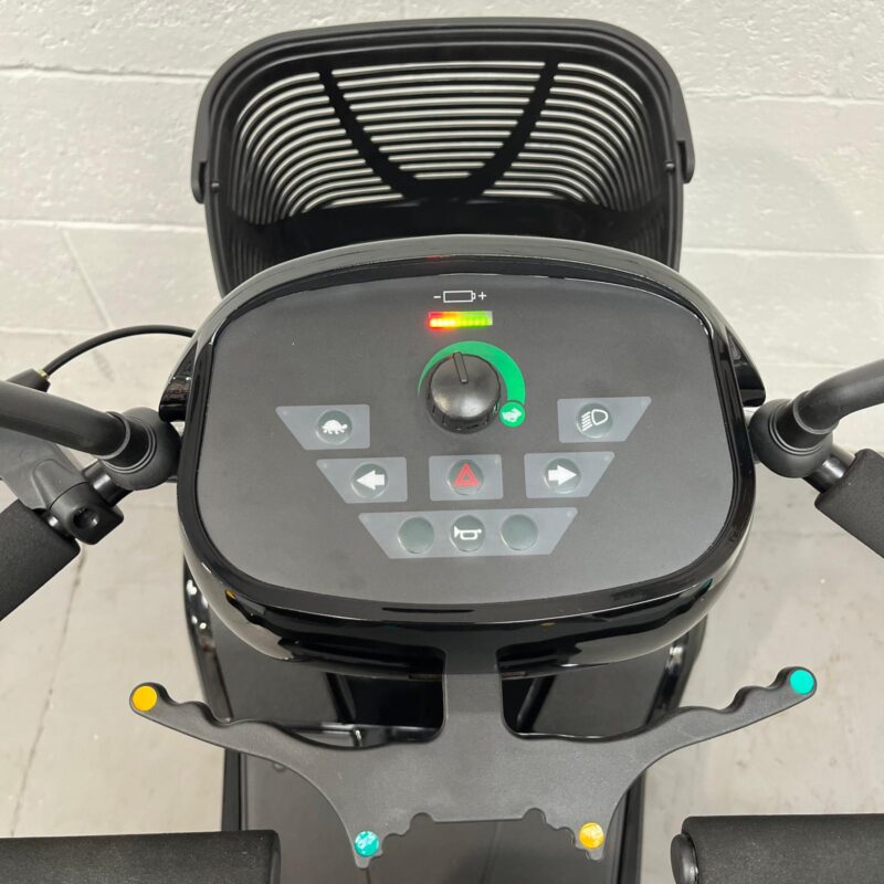 Photo Showing a Close-up of the Controls on a Black Stirling S700 Second-hand Mobility Scooter. Sunrise Medical Sterling S700