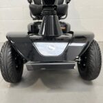 Photo Showing a Close-up View of the Front Bumper and Headlights on a Black Stirling S700 Second-hand Mobility Scooter. Sunrise Medical Sterling S700