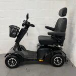 Photo of the Left Side of a Black Stirling S700 Second-hand Mobility Scooter. Sunrise Medical Sterling S700