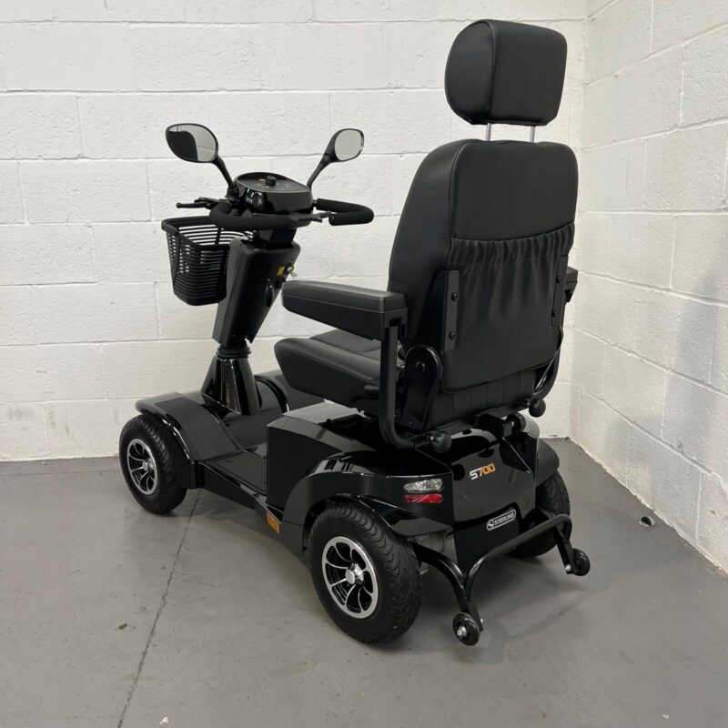 Photo Showing a Three-quarter View of the Left Side and Rear of a Black Stirling S700 Second-hand Mobility Scooter. Sunrise Medical Sterling S700
