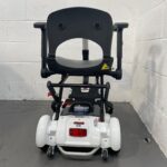 Photo of the Rear of a White and Black Tga Minimo Second-hand Mobility Scooter. Tga Minimo