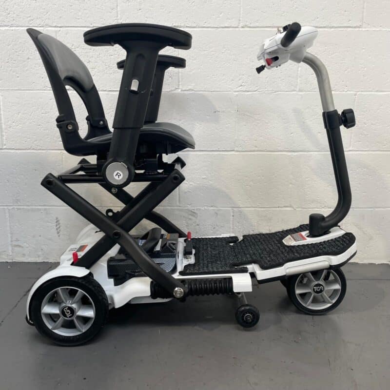 Photo of the Right Side of a White and Black Tga Minimo Second-hand Mobility Scooter. Tga Minimo