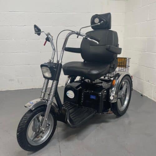 Photo showing a three-quarter view of the left side and front of a black and chrome TGA Supersport second-hand mobility scooter.