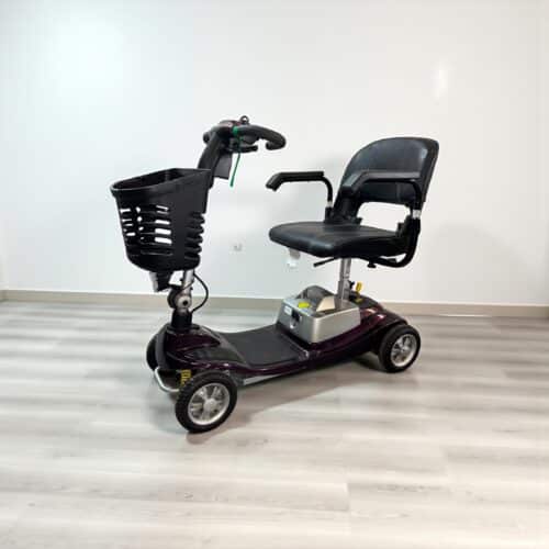 Photo showing a three-quarter view of the left of a Purple, One Rehab Illusion Second hand mobility scooter.
